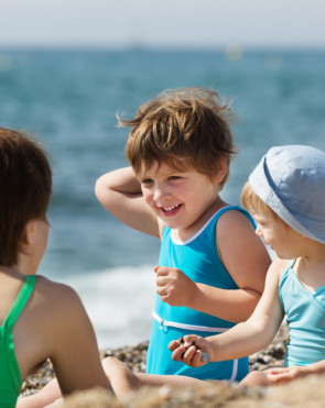 mother with  children at  beach