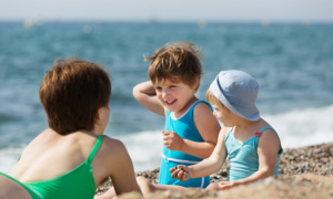 mother with  children at  beach